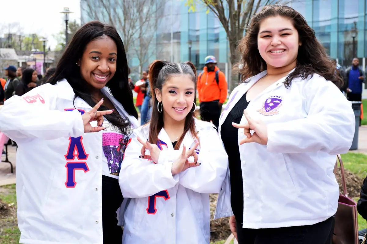Three girl wearing white sleeves